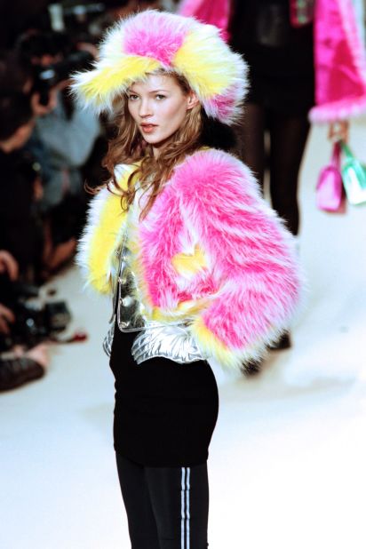 English model Kate Moss displays a faux-fur creation designed by Karl Lagerfeld for Channel's Autumn-Winter collection in 1994.