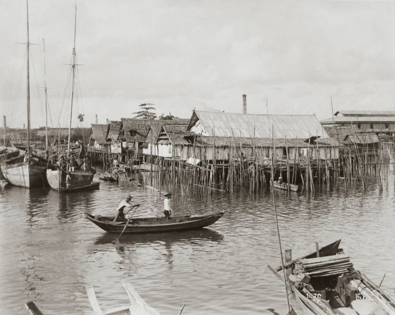 Some of Singapore's poorer population, who couldn't afford land tax, lived in homes that were built on stilts on the water.
