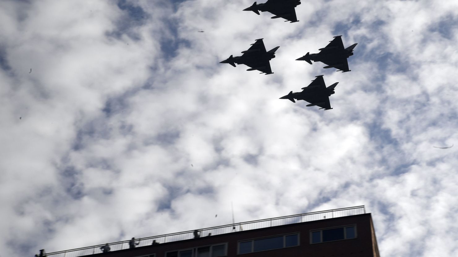 Spanish Eurofighter planes fly during the Spanish National Day military parade in Madrid on Thursday.
