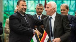 Fatah's Azzam al-Ahmad (R) and Saleh al-Aruri (L) of Hamas shake hands after signing a reconciliation deal in Cairo last week, as the two rival Palestinian movements ended their decade-long split following negotiations overseen by Egypt.
