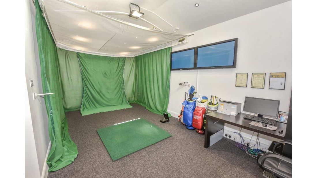 Even in rainy weather, McIlroy could step into the garage and work on his long game with an electronic swing studio.