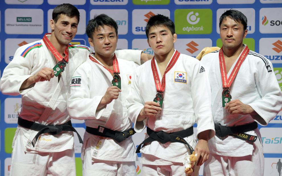 Here he stands (second from left) with, from left, silver medalist Rustam Orujov, South-Korean Changrim An and Mongolia's Odbayar Ganbaatar, who both won bronze.