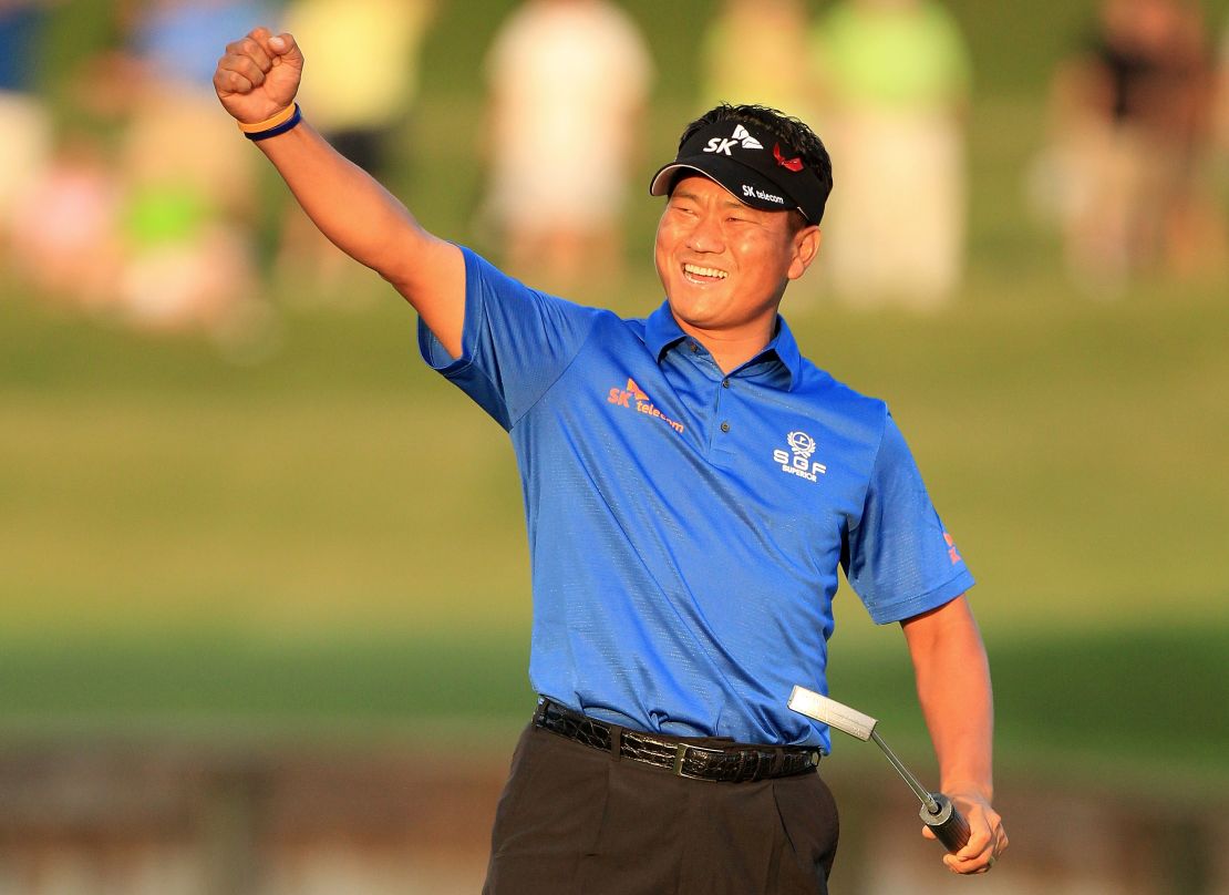 KJ Choi celebrates winning the 2011 Players Championship at TPC Sawgrass.