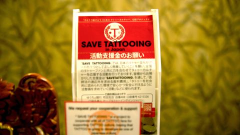 A sign supporting "Save Tattooing in Japan" at Ron Sugano's tattoo parlour, Shi Ryu Doh.