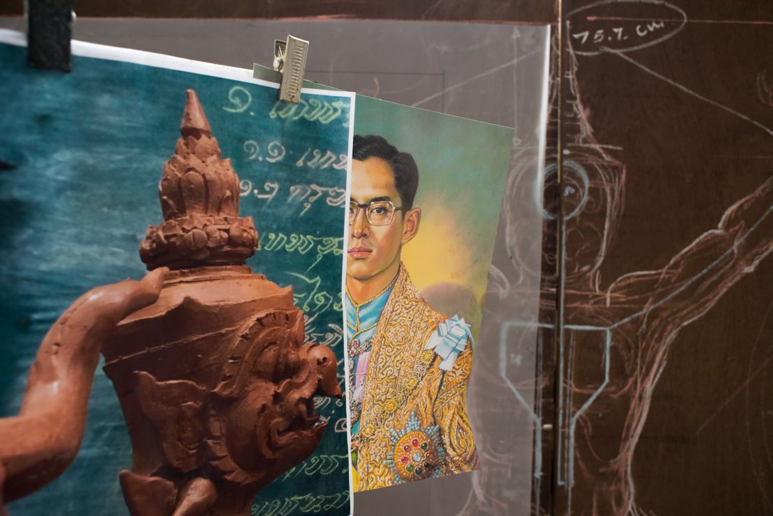 An image of King Bhumibol Adulyadej as a young man on display at a government art studio outside Bangkok. 