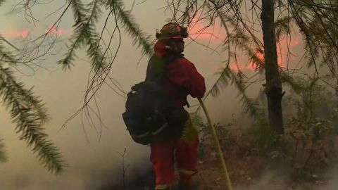 01 inmates fight CA fires