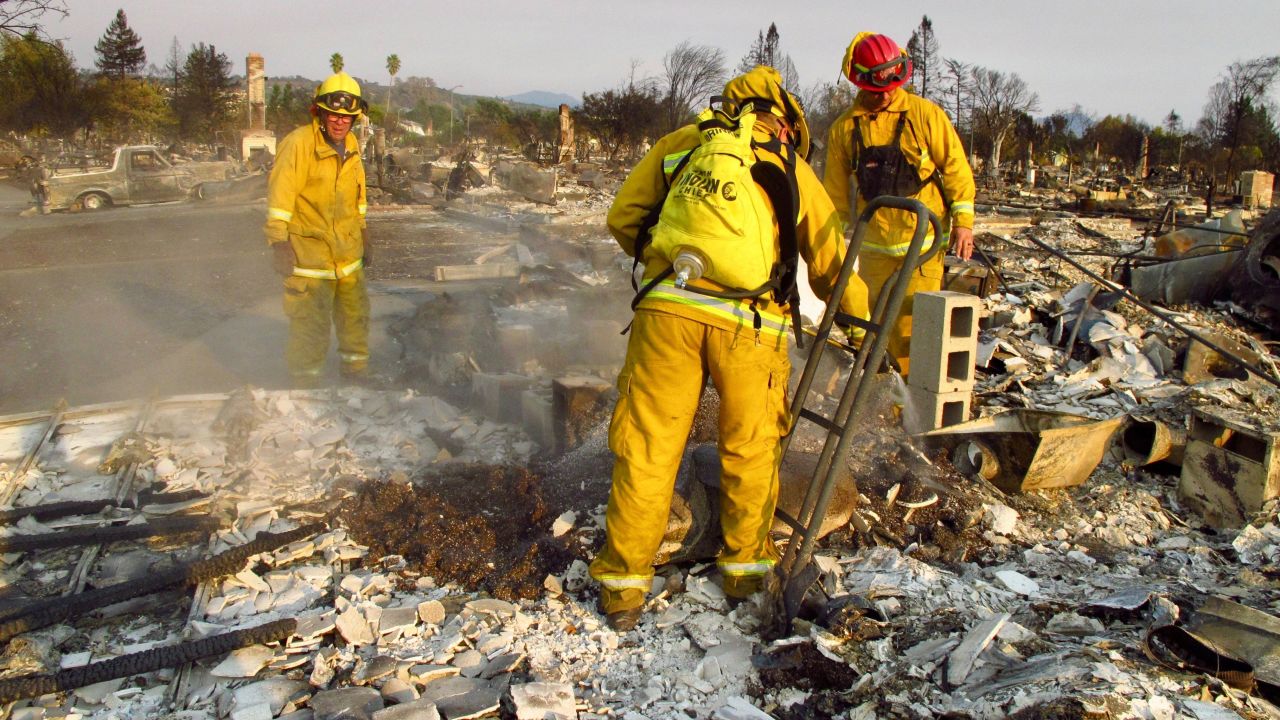 Crews search through debris this week in a Santa Rosa neighborhood destroyed by fire.