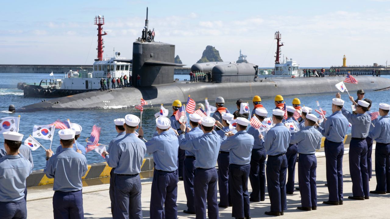 The Ohio-class guided-missile submarine USS Michigan pulls into Busan Naval Base in South Korea on Friday.