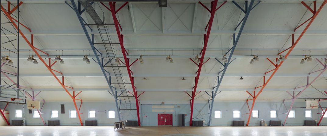 Liggett Hall, designed by McKim, Meade & White and opened in 1921, is the largest building on Governors Island in New York. This gymnasium was used by the Coast Guard until their departure in 1996.