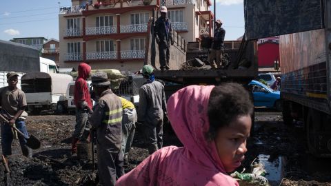 Council workers clear garbage during the clean-up of the market of Anosibe in Antananarivo. Rats are porters of fleas which spread the bubonic plague and are attracted by garbages and unsalubrity. 