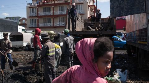 Council workers clear garbage during the clean-up of the market of Anosibe in Antananarivo. Rats are porters of fleas which spread the bubonic plague and are attracted by garbages and unsalubrity.