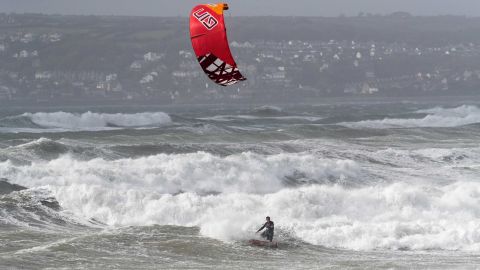 A man kite surfs in St Mount's Bay near Penzance, England, on October 16, 2017.