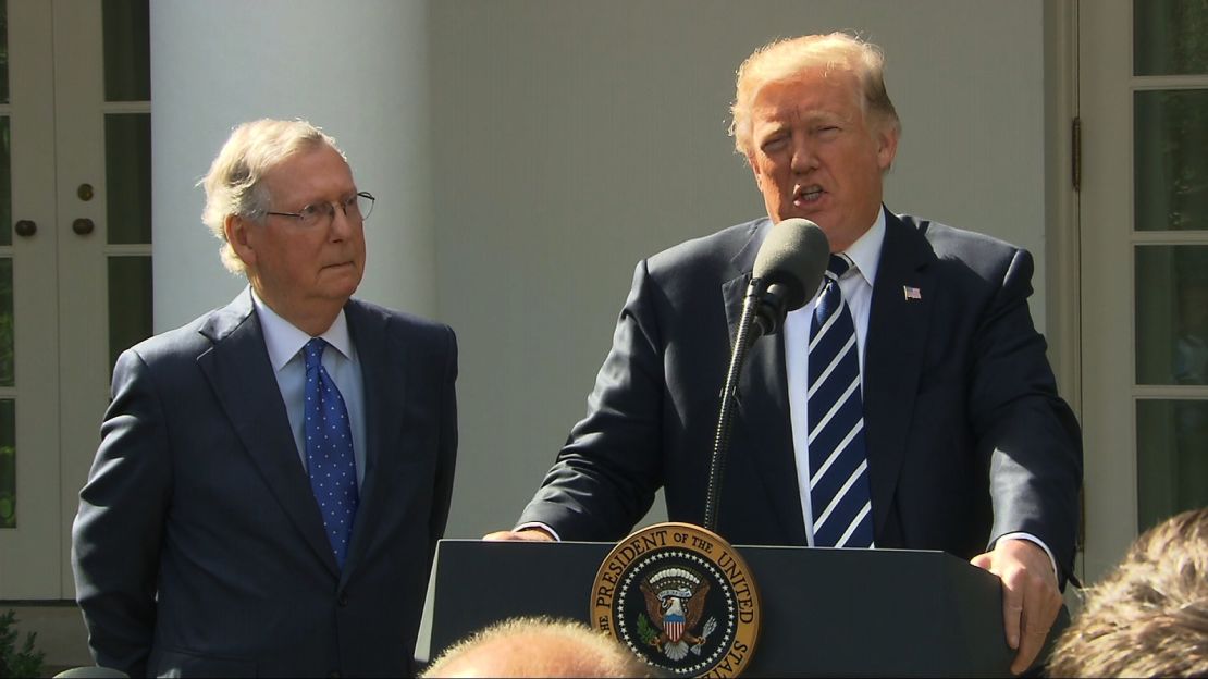 President Donald Trump (right) and Senate Majority Leader Mitch McConnell speak Monday in the White House Rose Garden.