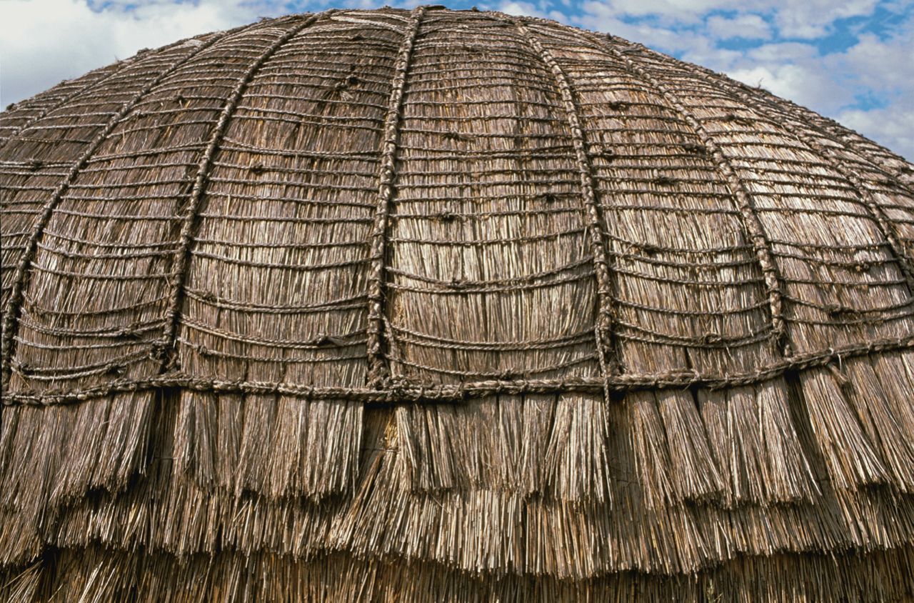 Traditional "beehive" Zulu homes are made from varieties of dried grass. The materials shrink in the summer, creating small gaps and allowing cooling air to pass through the structure.