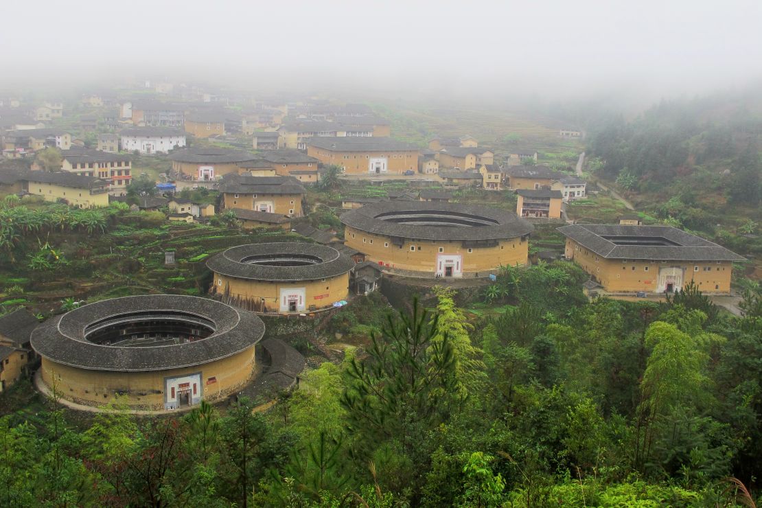 Circular tulou buildings are designed to offer protection from the monsoon rains of southern China.  
