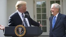 President Donald Trump speaks to the press alongside Senate Majority Leader Mitch McConnell (R), Republican of Kentucky, in the Rose Garden of the White House in Washington, DC, on October 16, 2017.