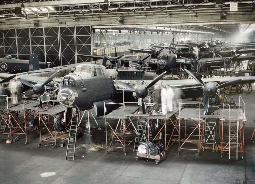 Lancaster bombers nearing completion in Avro's assembly plant at Woodford near Manchester, 1943. Some 125,000 British aircraft were built during the Second World War, and over half of the workforce were women.