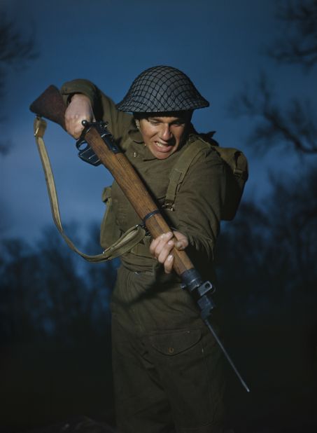 The image shows Private Alfred Campin of the 6th Battalion, Durham Light Infantry during battle training in Britain, March 1944.<br />"This is one of my favorite shots," said Ian Carter, author of an Imperial War Museums book in which they were published. You can see the tan in the man's face and you can see he's a veteran of the desert. This was part of a whole sequence taken in black and white, with just a few color shots. This soldier was killed in Normandy, but he's immortalized by this picture."<br />