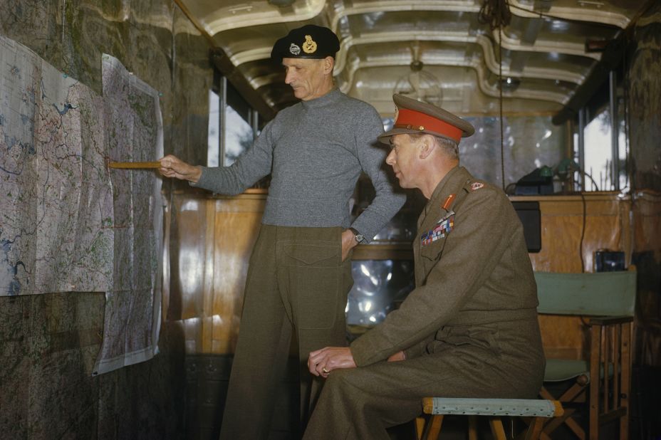 Field Marshal Sir Bernard Montgomery explains Allied strategy to King George VI in his command caravan in Holland, October 1944.