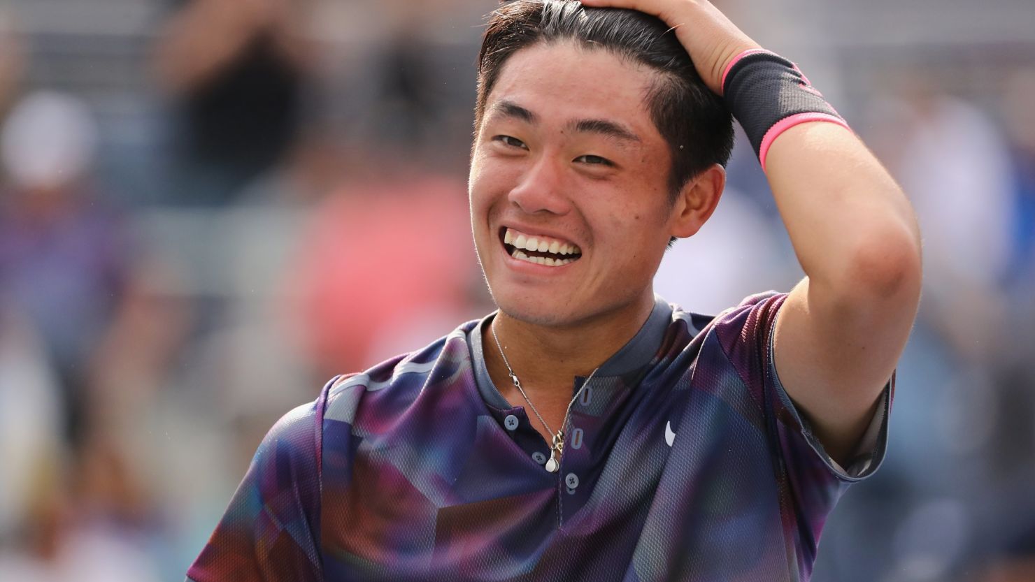 Wu  Yibing celebrates after winning China's first US Open boys' title.