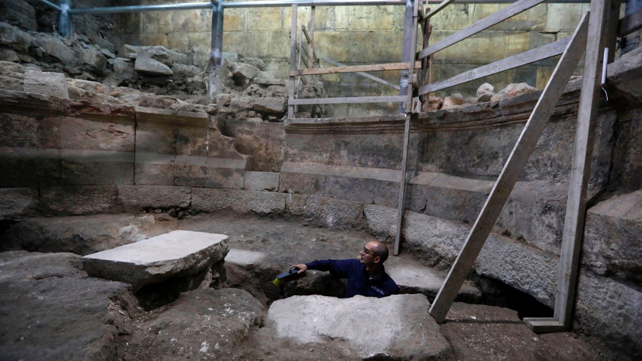 Joe Uziel, an archeologist from the Israeli Antiquity Authority, works on the recently discovered ancient  theater.