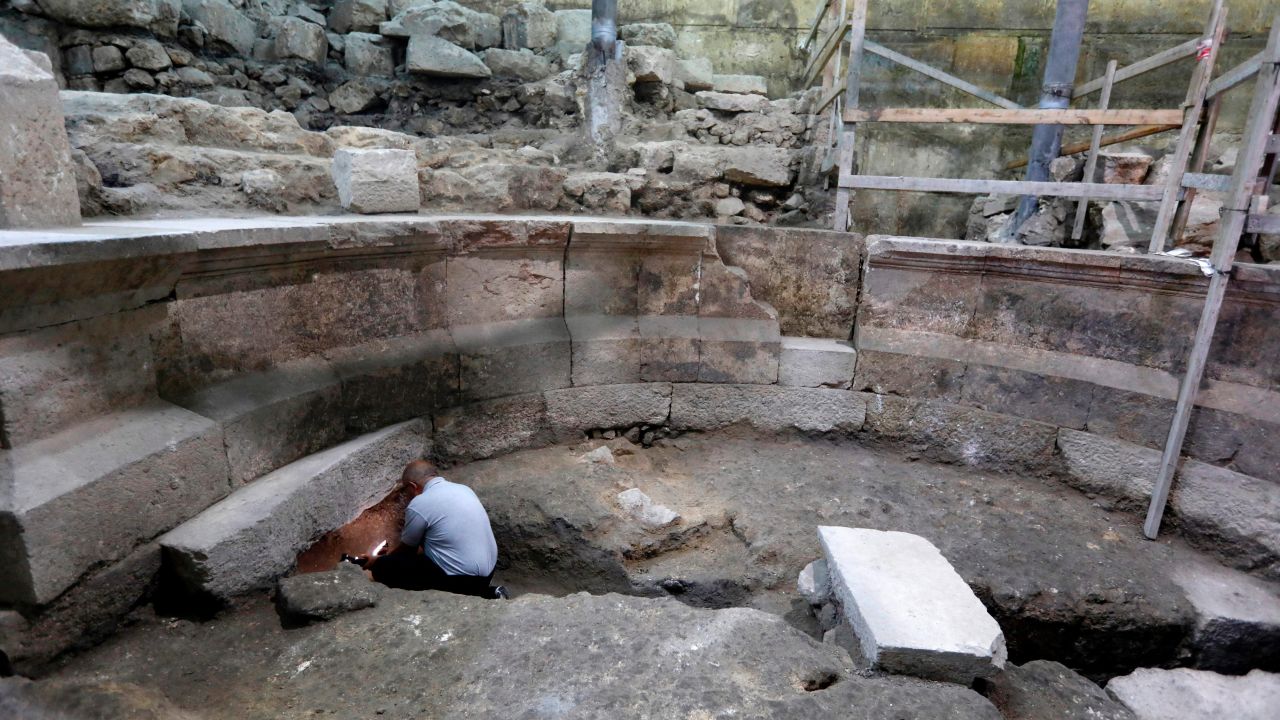 A journalist examines part of the theater.