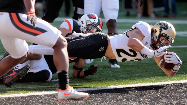 Colorado running back Phillip Lindsay dives into the end zone for a touchdown during the second half of an NCAA college football game against Oregon State on Saturday, October 14, in Corvallis, Oregon.