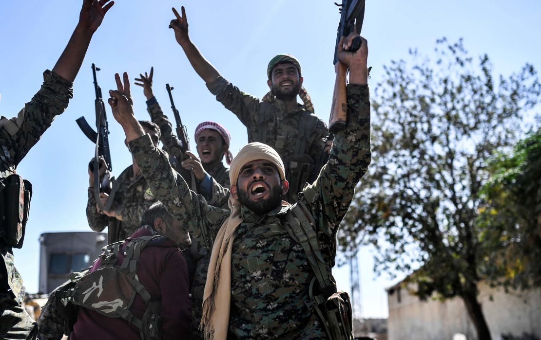 Syrian Democratic Forces celebrate in Raqqa.