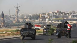 Iraqi forces advance towards the centre of Kirkuk during an operation against Kurdish fighters on October 16, 2017. 
Iraqi forces seized the Kirkuk governor's office, key military sites and an oil field as they swept across the disputed province following soaring tensions over an independence referendum. / AFP PHOTO / AHMAD AL-RUBAYE        (Photo credit should read AHMAD AL-RUBAYE/AFP/Getty Images)