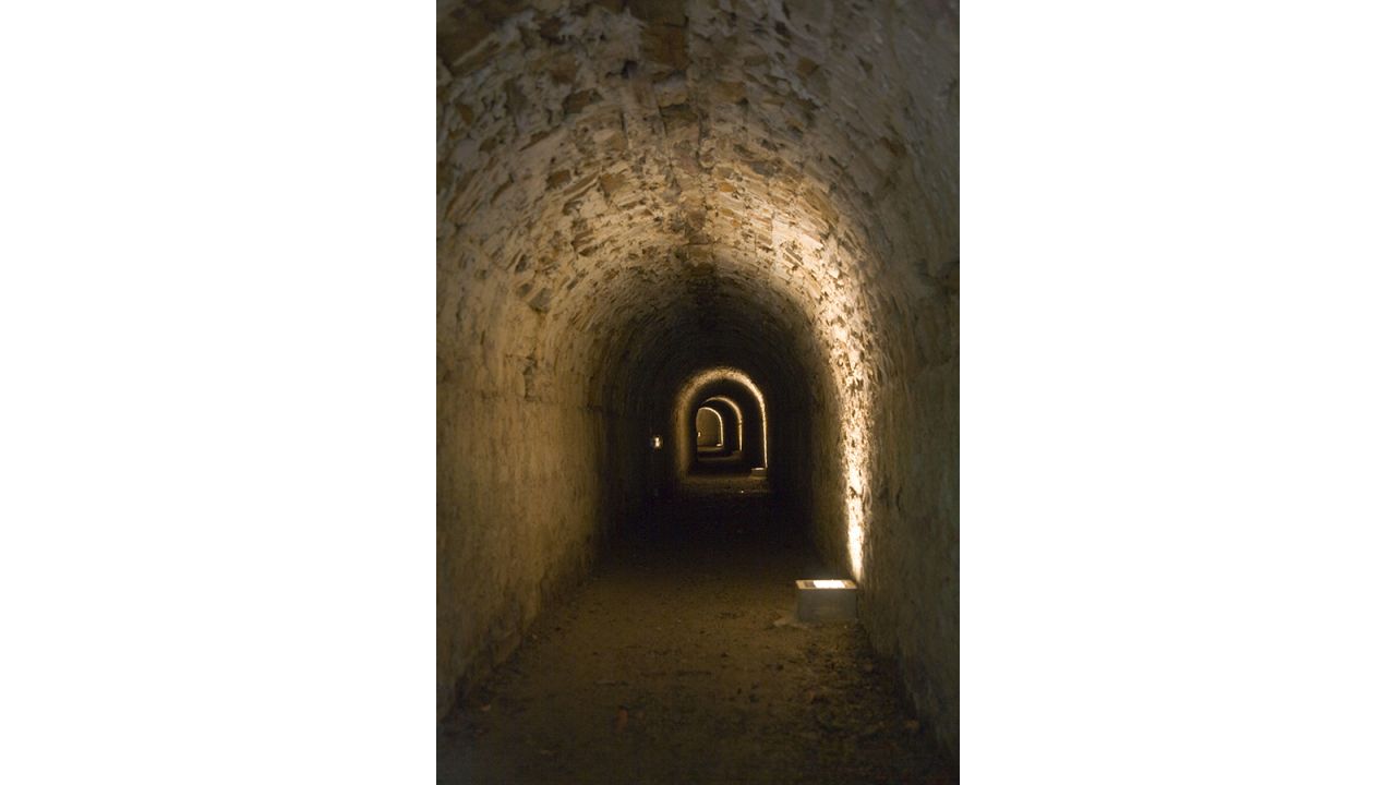<strong>Tunnel, Château de Brissac, Angers, France</strong>: "What's striking when you visit a haunted site is the atmosphere you can encounter," says Grenville. This 14th century French chateau is supposedly haunted by "the Green Lady." Since she was killed by her husband for her infidelity, the spectre roams the corridors in her favorite emerald-colored dress. 