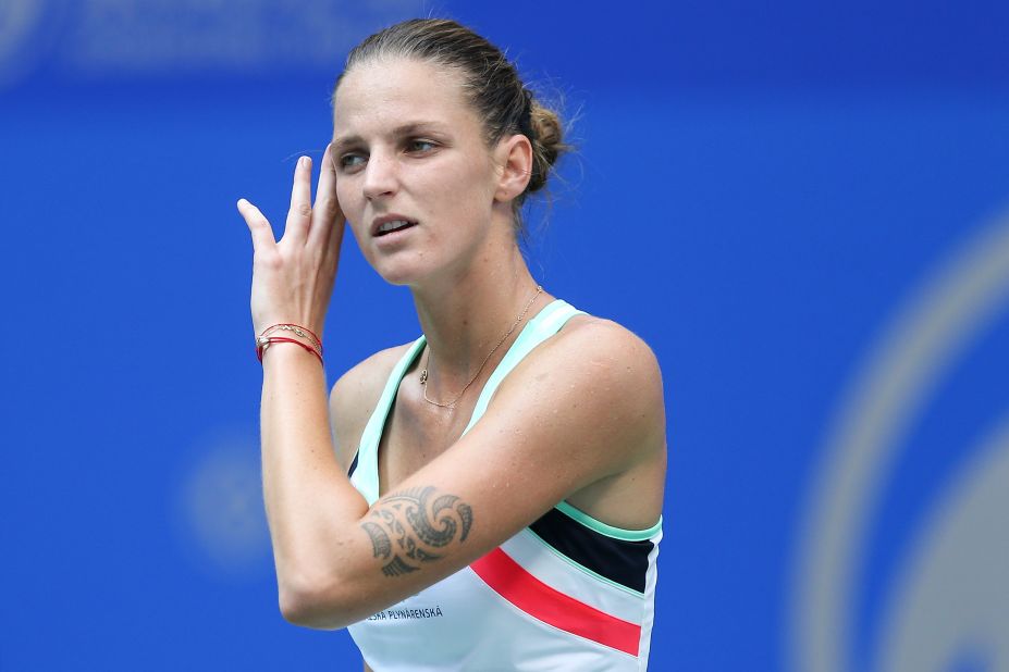 Czech tennis player Karolina Pliskova has two Polynesian-style tattoos, one on her left thigh and the other on her left arm -- they come in useful when needing to tell her and her twin sister, Kristyna, apart. 