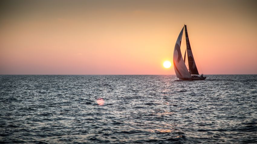 AT SEA - JANUARY 7: In this handout image provided by the Volvo Ocean Race, onboard Abu Dhabi Ocean Racing. A silhouetted Team Alvimedica behind an Indian Ocean Sunset as Abu Dhabi Ocean Racing rolls underneath them into third place during Leg 3 Abu Dhabi, UAE and Sanya, China. The Volvo Ocean Race 2014-15 is the 12th running of this ocean marathon. Starting from Alicante in Spain on October 11, 2014, the route, spanning some 39,379 nautical miles, visits 11 ports in 11 countries (Spain, South Africa, United Arab Emirates, China, New Zealand, Brazil, United States, Portugal, France, the Netherlands and Sweden) over nine months. The Volvo Ocean Race is the world's premier ocean race for professional racing crews. (Photo by Matt Knighton/Abu Dhabi Ocean Racing/Volvo Ocean Race via Getty Images)