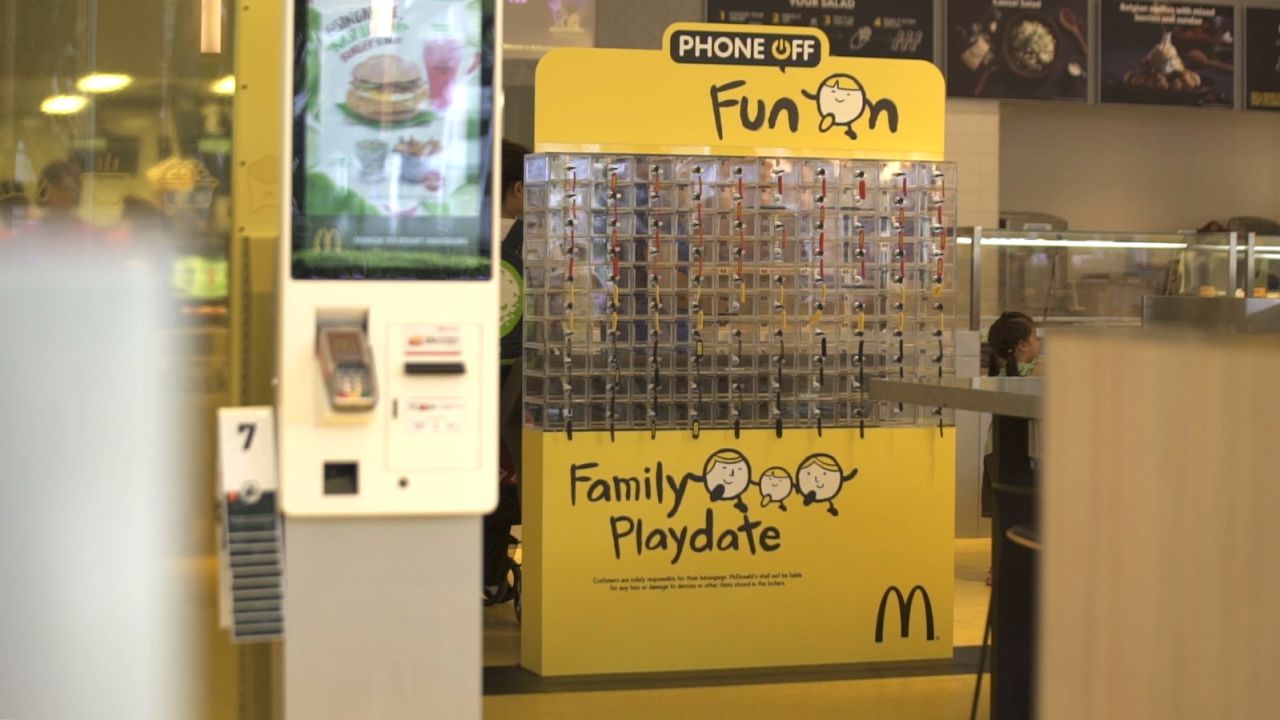 Two-thirds of parents and children say they use smartphones during mealtime, and McDonald's has a way to stop that.
