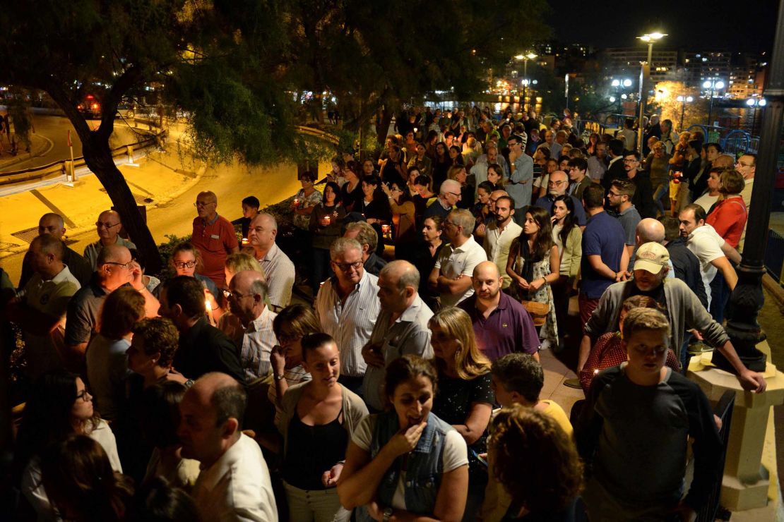 Thousands of people gather for a candlelight vigil in Sliema on October 16, 2017.