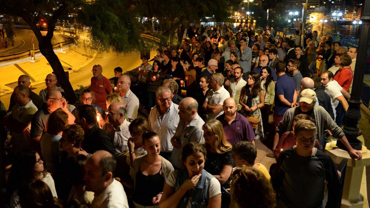 Thousands of people gather for a candlelight vigil in Sliema on October 16, 2017.