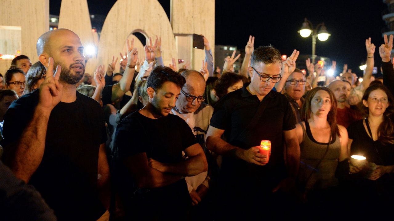 Thousands of people gather for a candlelight vigil in Sliema in tribute to Caruana Galizia on Monday.