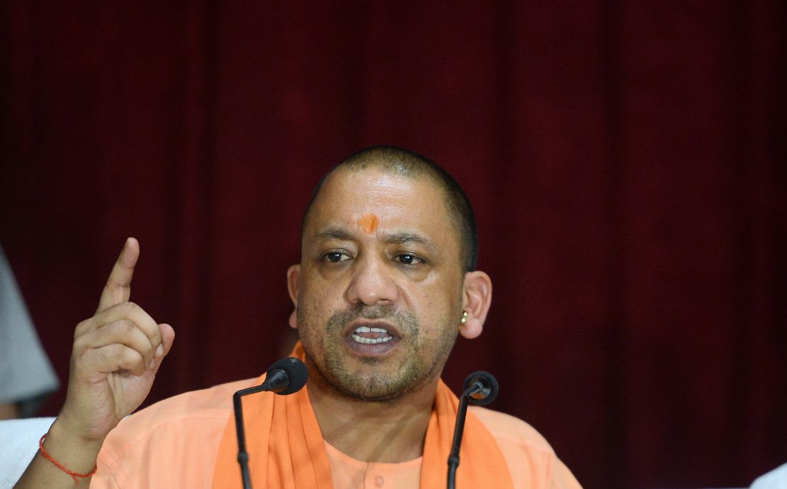 Uttar Pradesh Chief Minister Yogi Adityanath gestures during a press conference, August 13, 2017.
