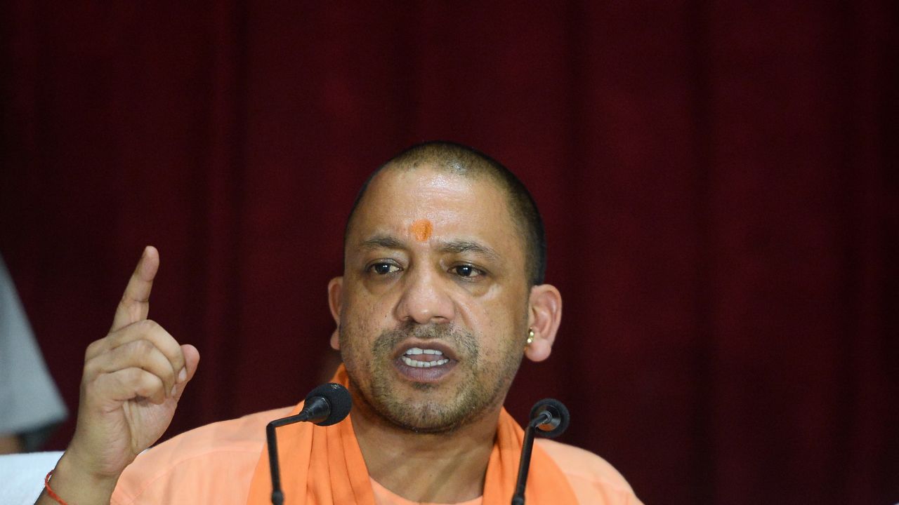 Uttar Pradesh Chief Minister Yogi Adityanath gestures during a press conference, August 13, 2017.
