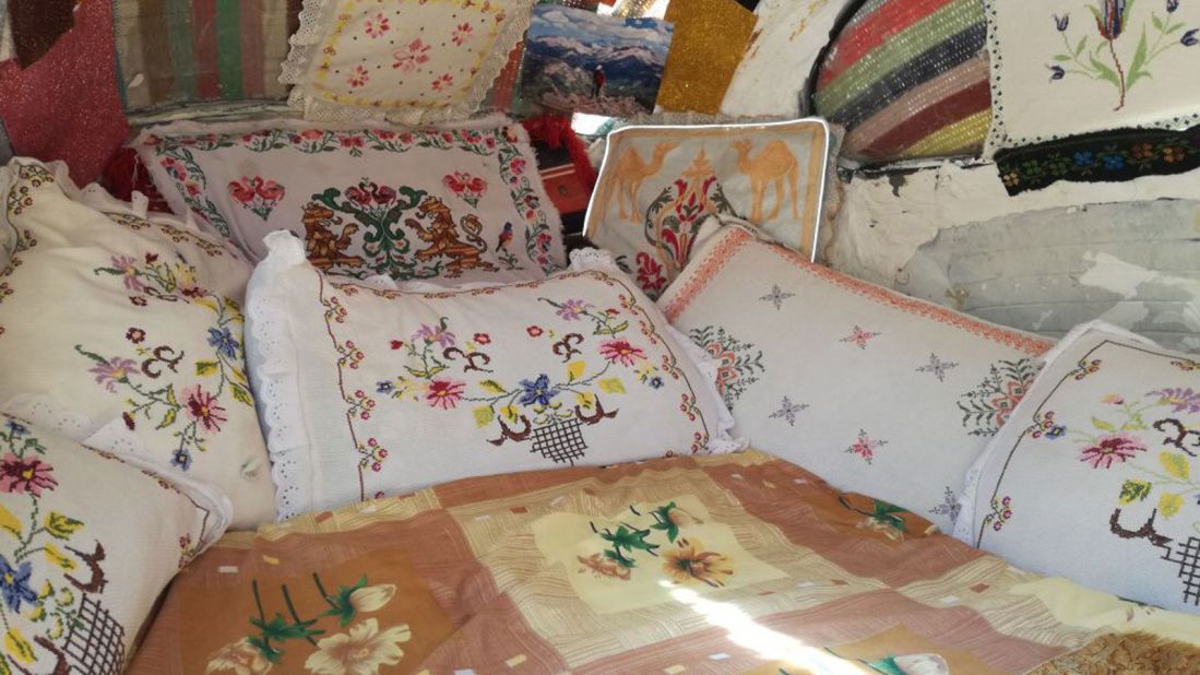 <strong>Interior design:</strong> The "hotel," decorated with handmade embroidered sheets and pillows, can sleep two guests at a time. 