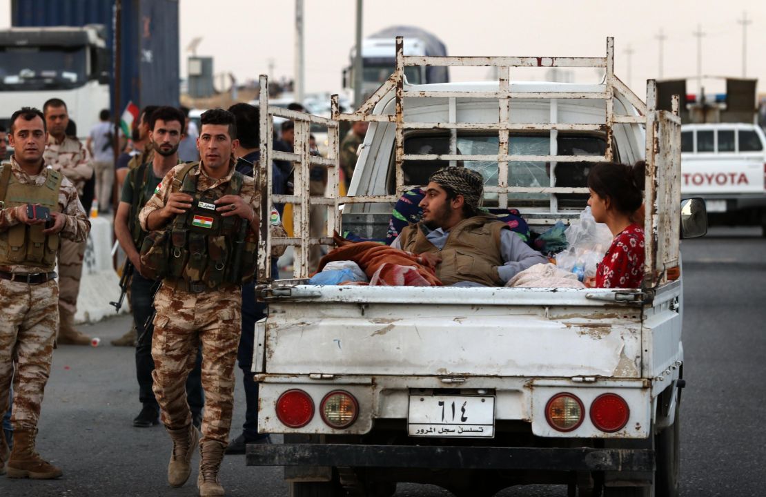 Iraqi families flee violence in Kirkuk province in October, 2017.