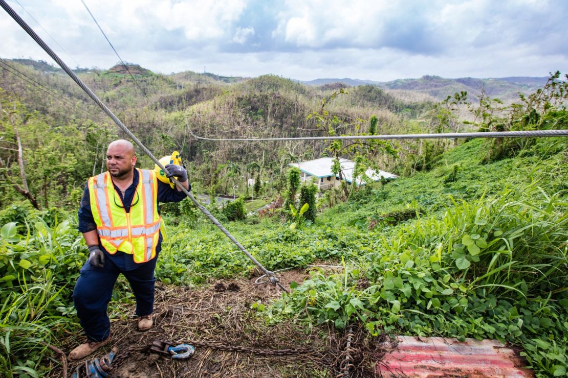 Getting power back to hilltop communities like Aguas Buenas after Hurricane Maria requires work in tough terrain.