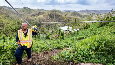 Getting power back to hilltop communities like Aguas Buenas requires work in tough terrain.