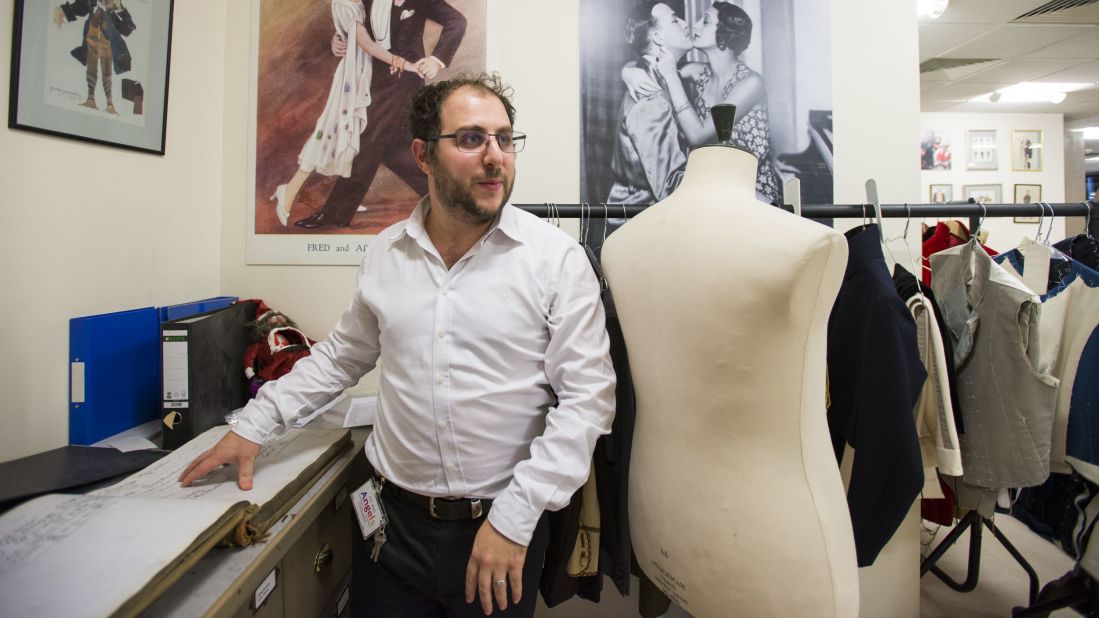 <strong>Tailoring rooms: </strong>Jeremy Angel gives CNN Travel a tour of his family business. In the Hendon tailoring rooms, there are record books with details of customers such as Noel Coward. There's also a former employee listed merely as Lee; he's better known as the late designer Alexander McQueen. 