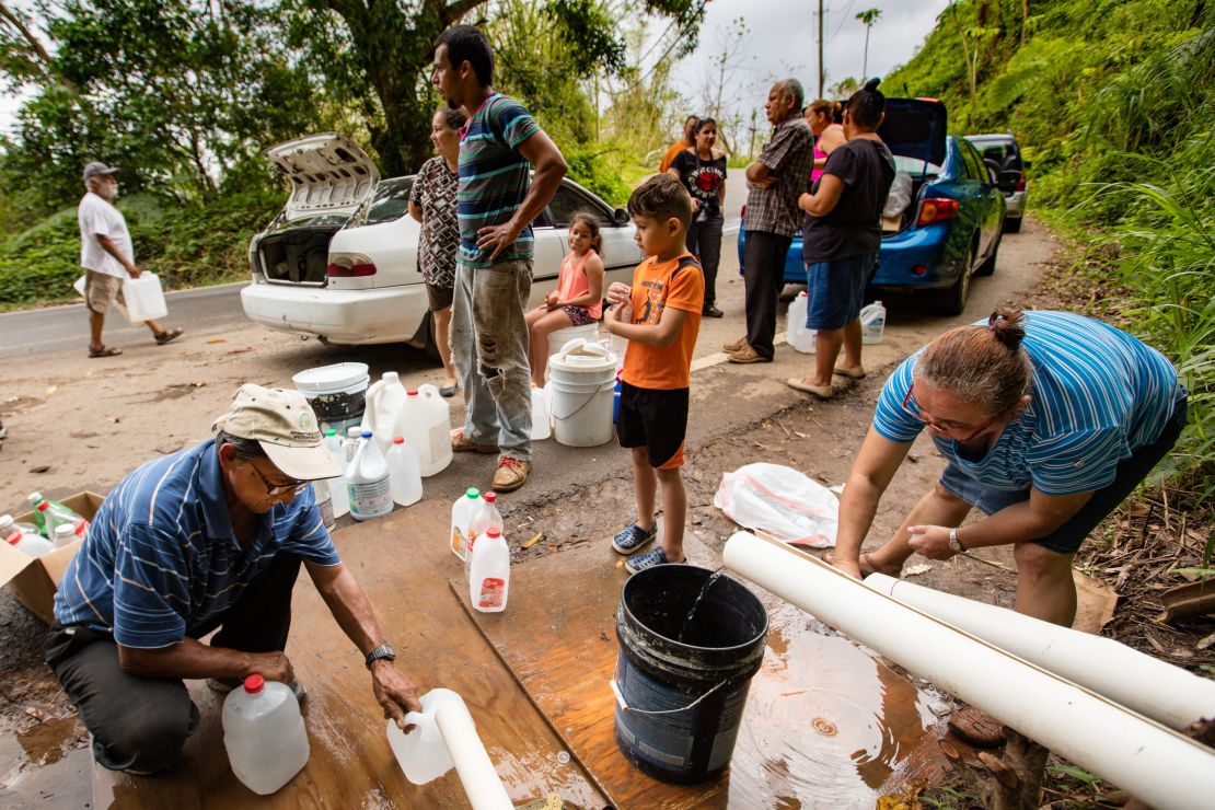 Veterans helped residents of Las Marias to purify this water they are collecting from the mountainside. 