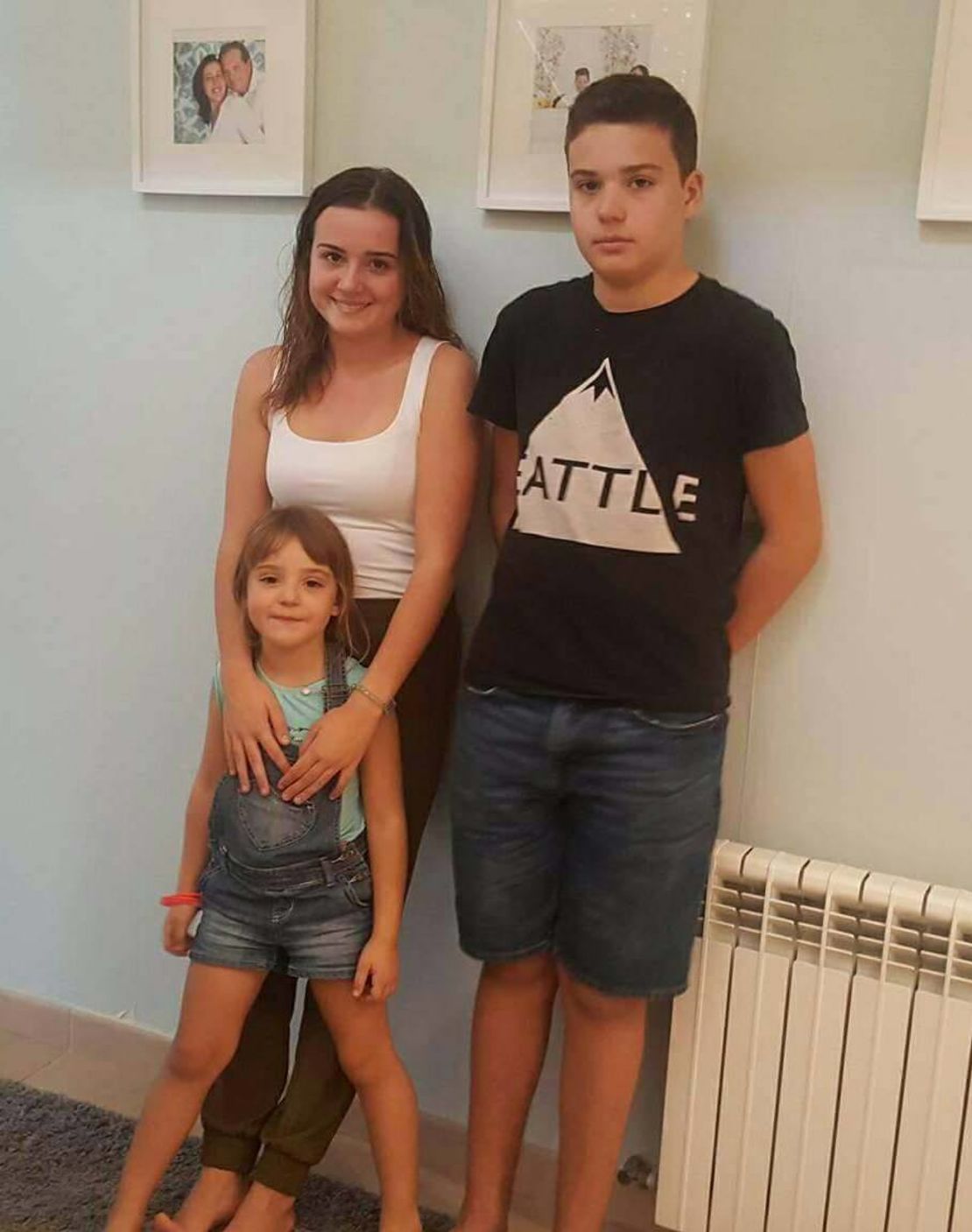 Claudia,18, with her siblings Martim, 14, and Mariana, 5. All three are part of the group taking on the Council of Europe.