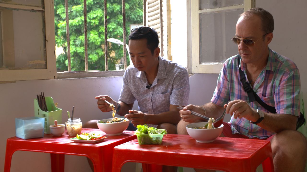 Van Cong Tu (L) and Mark Lowerson (R) of Hanoi Street Food Tours