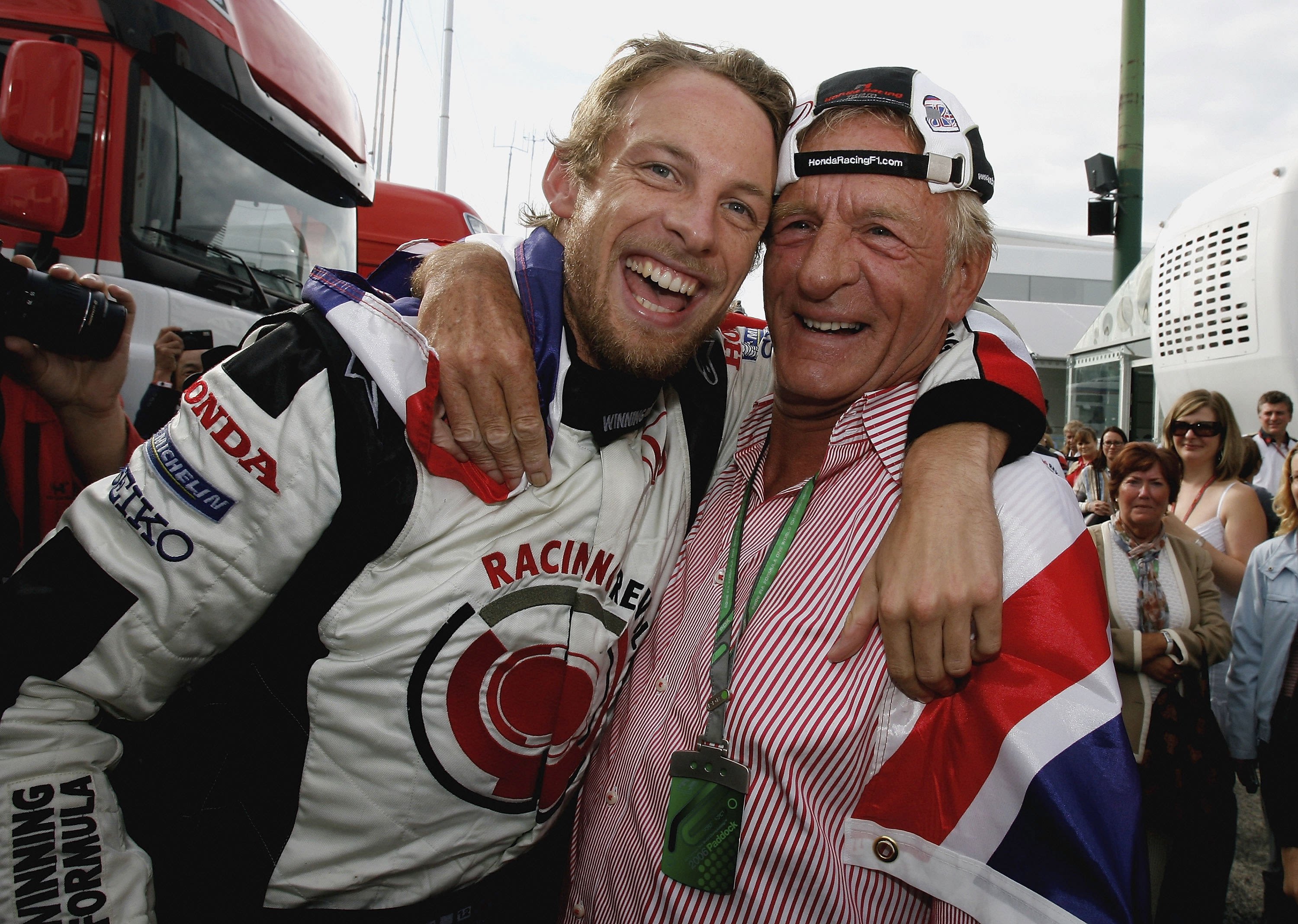 Button raced more than 300 times in F1. His first race win came in his 113th start at the 2006 Hungarian Grand Prix. Here he is celebrating the victory win his dad, John at the Hungaroring. 