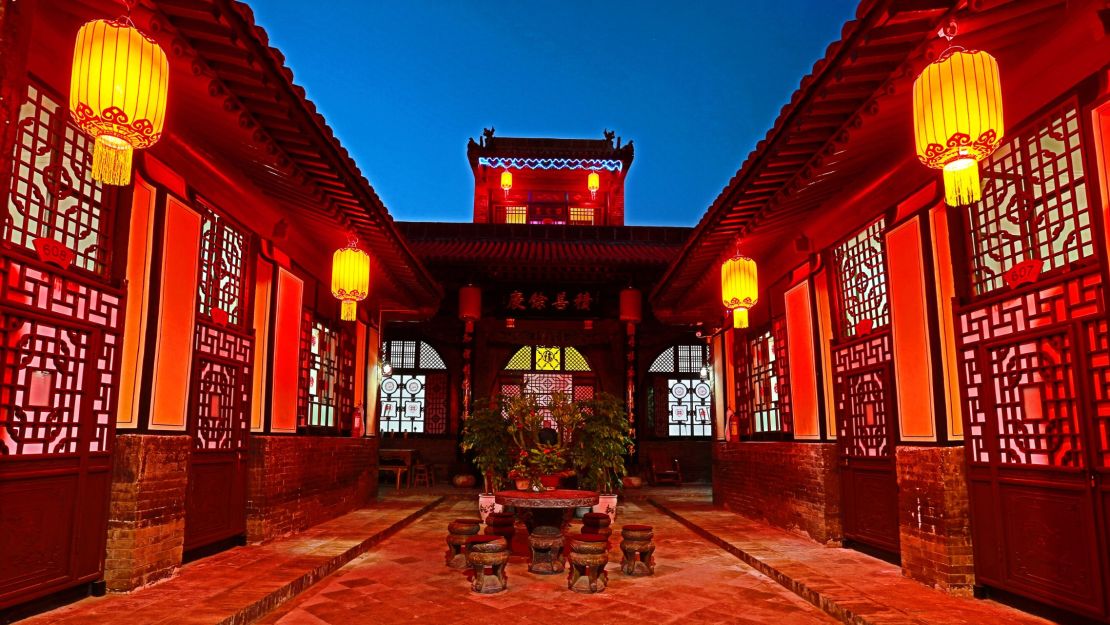 The courtyard at Xiang Sheng Yuan Guest House, pictured at night.