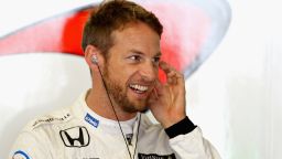 SUZUKA, JAPAN - OCTOBER 08:  Jenson Button of Great Britain and McLaren Honda gets ready in the garage during final practice for the Formula One Grand Prix of Japan at Suzuka Circuit on October 8, 2016 in Suzuka.  (Photo by Clive Mason/Getty Images)