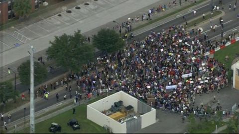 Crowds gather outside Richard Spencer's speech at the Phillips Center at the University of Florida.